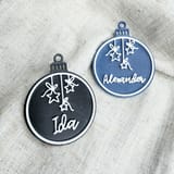 Blaue Alexander-Kugel und schwarze Ida-Kugel mit weißen Sternen.